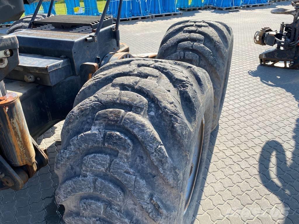 Komatsu 911.5 Betakarítók
