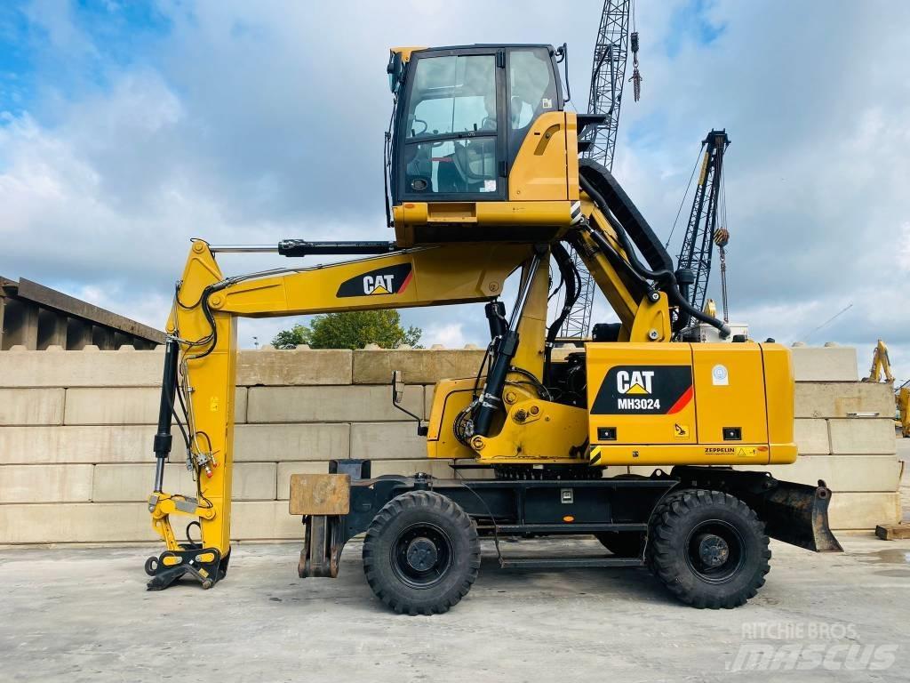 CAT mh3024 Gumikerekes kotrók