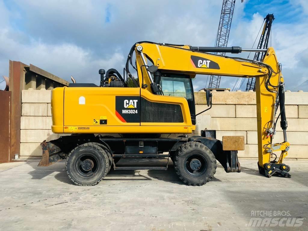 CAT mh3024 Gumikerekes kotrók