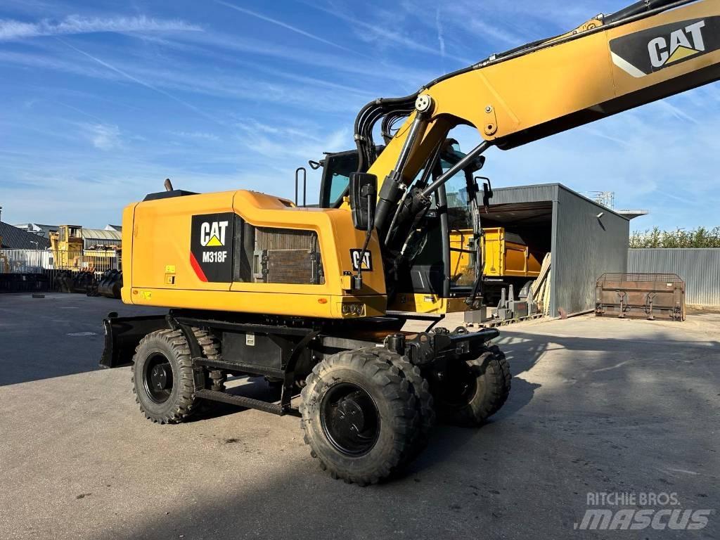 CAT M 318 F Gumikerekes kotrók