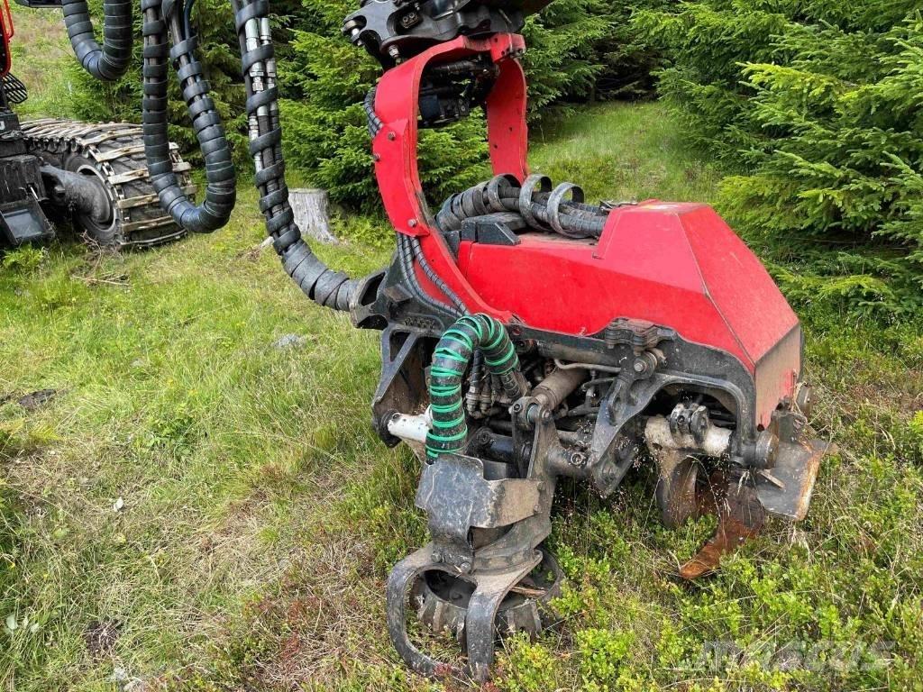 Komatsu 931 XC Betakarítók