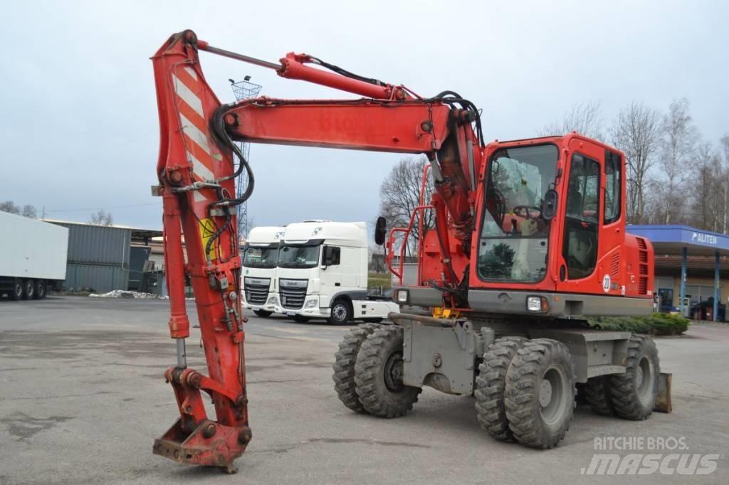 Komatsu PW 148-8 Gumikerekes kotrók