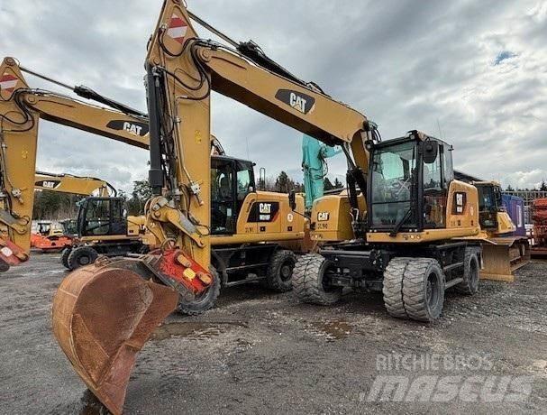 CAT M318F Gumikerekes kotrók