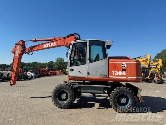 Atlas 1304 Gumikerekes kotrók