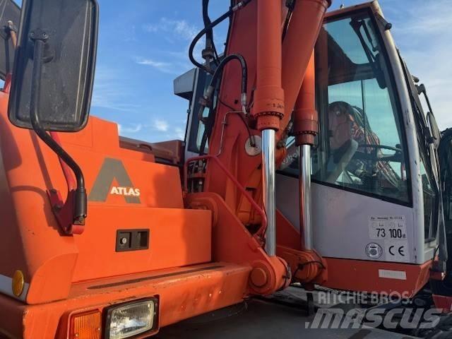 Atlas 1304 Gumikerekes kotrók