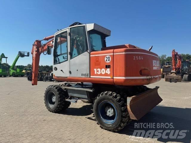 Atlas 1304 Gumikerekes kotrók