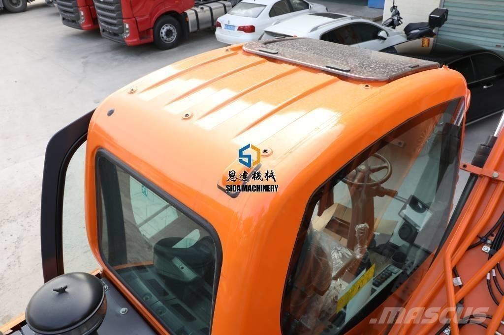 Develon DX125W Gumikerekes kotrók