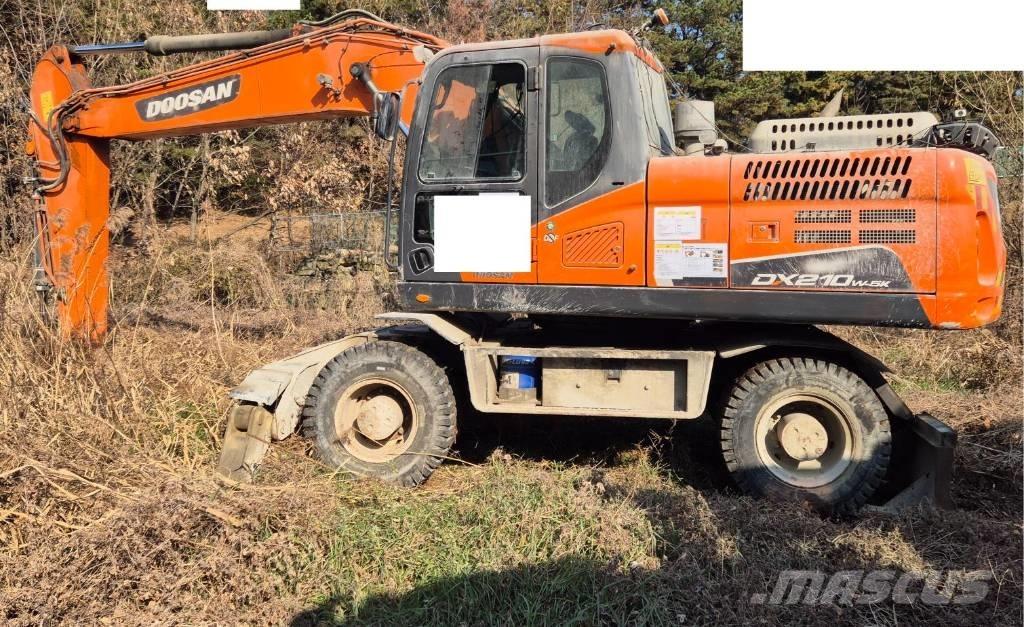 Doosan DX 210 W Gumikerekes kotrók