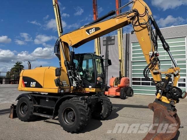 CAT M 313 D Gumikerekes kotrók