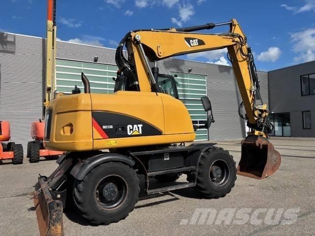 CAT M 313 D Gumikerekes kotrók