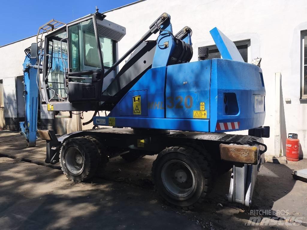 Terex FUCHS 320 Gumikerekes kotrók