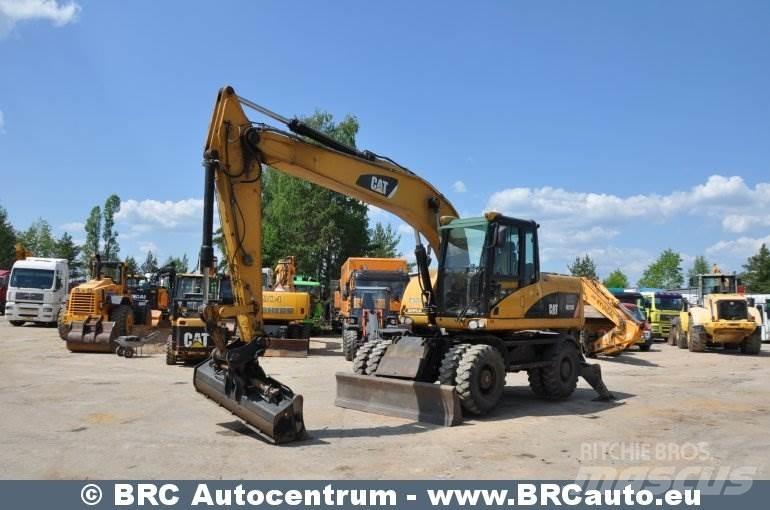CAT M316D Gumikerekes kotrók