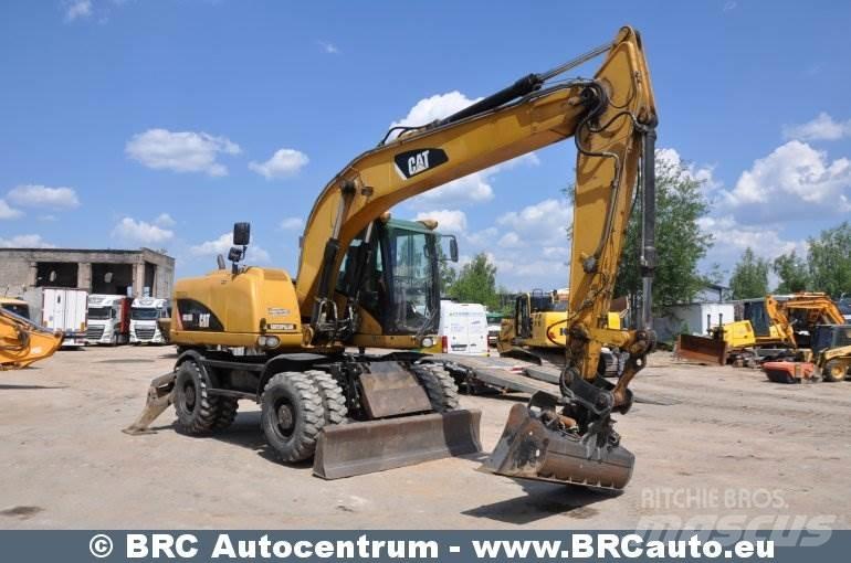 CAT M316D Gumikerekes kotrók