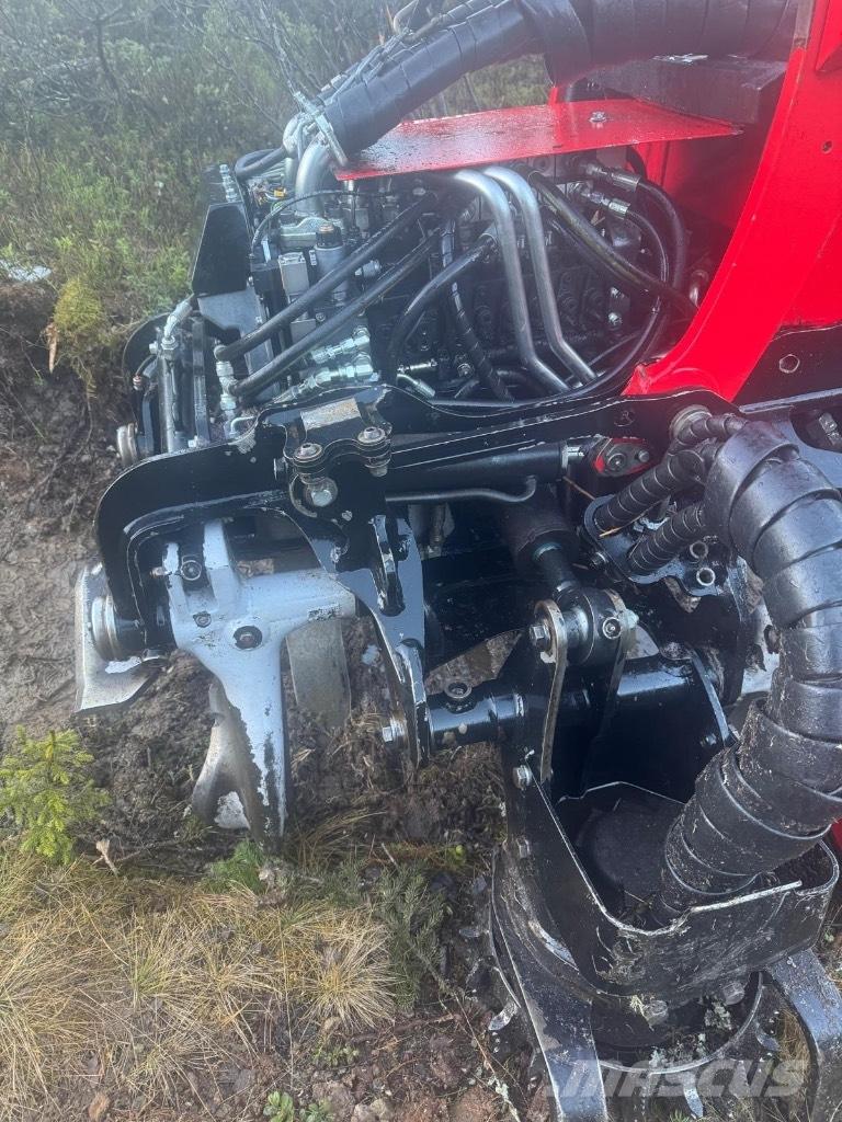 Komatsu 931 XC Betakarítók