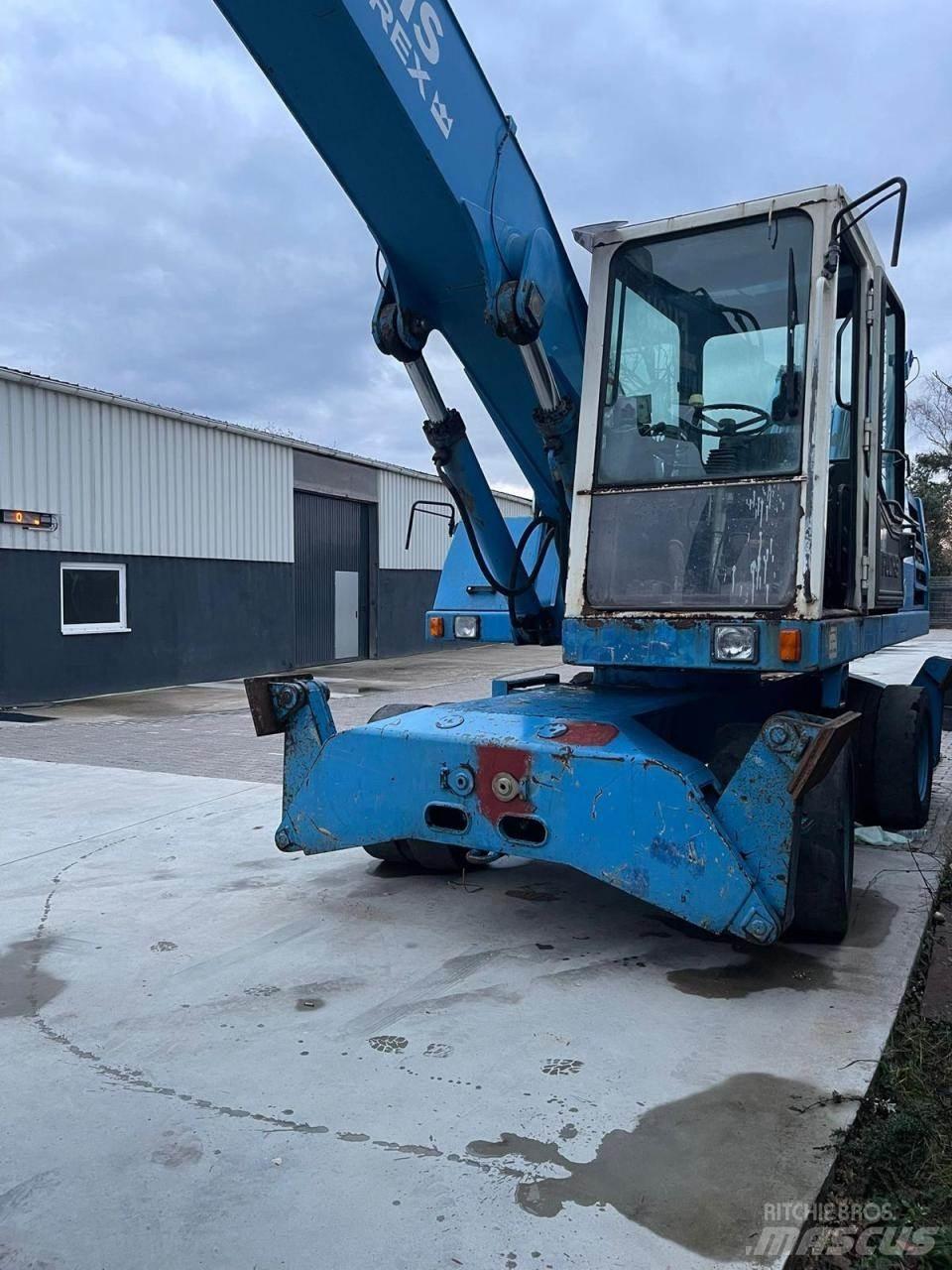 Fuchs MHL 331 Gumikerekes kotrók