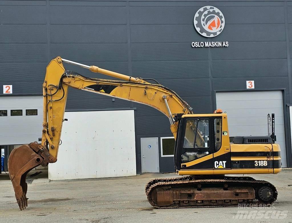 CAT 318 B L Lánctalpas kotrók