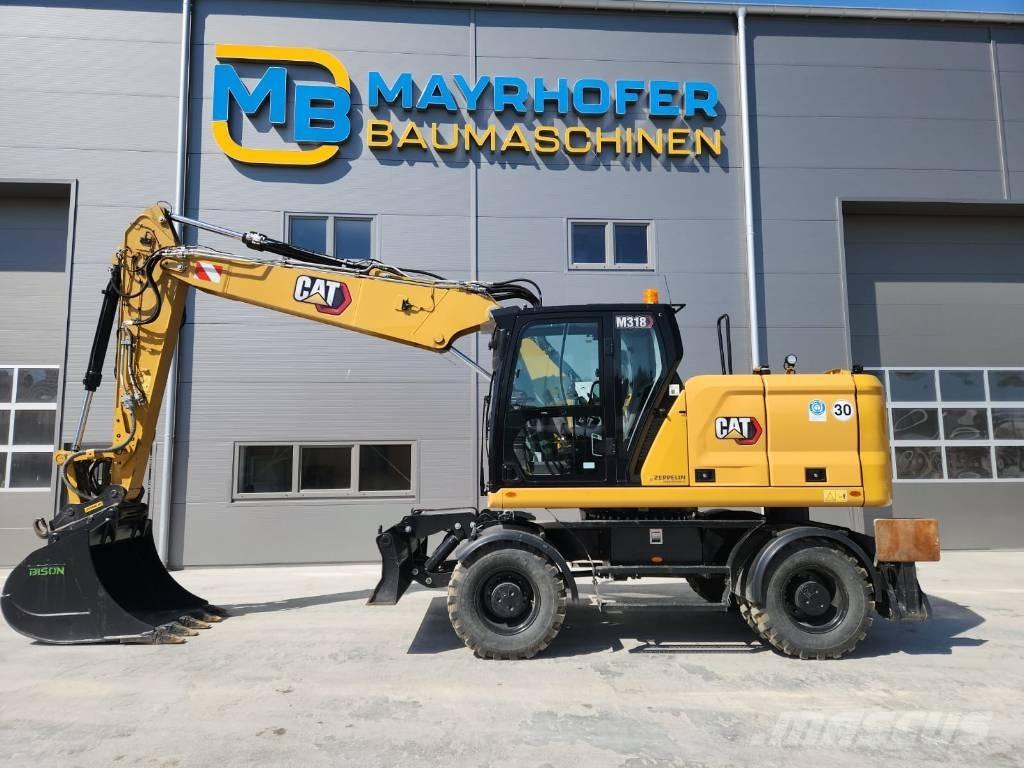 CAT M 318 Gumikerekes kotrók