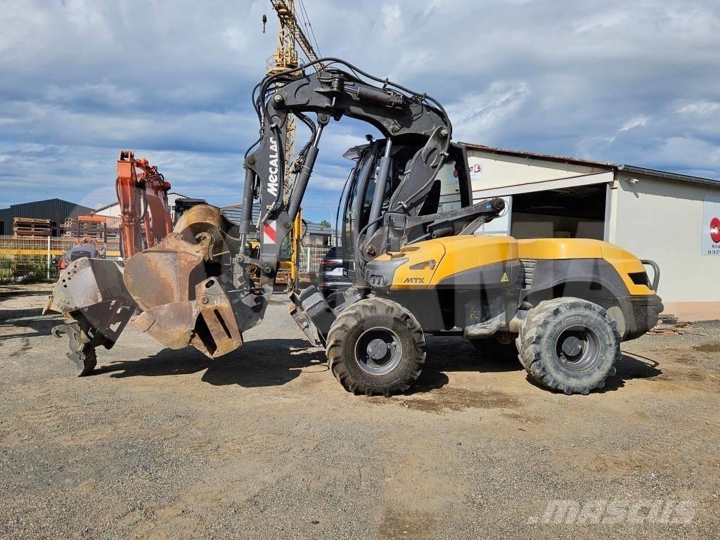 Mecalac 12 MTX Gumikerekes kotrók