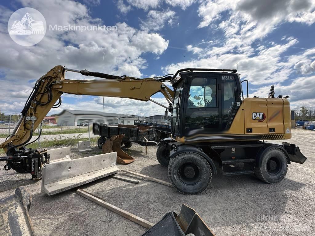 CAT M 314 Gumikerekes kotrók