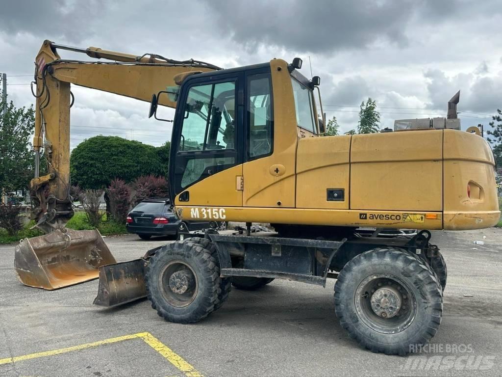 CAT 315 C Gumikerekes kotrók