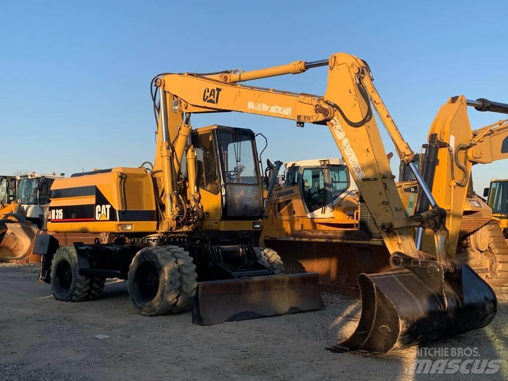 CAT M 315 Gumikerekes kotrók