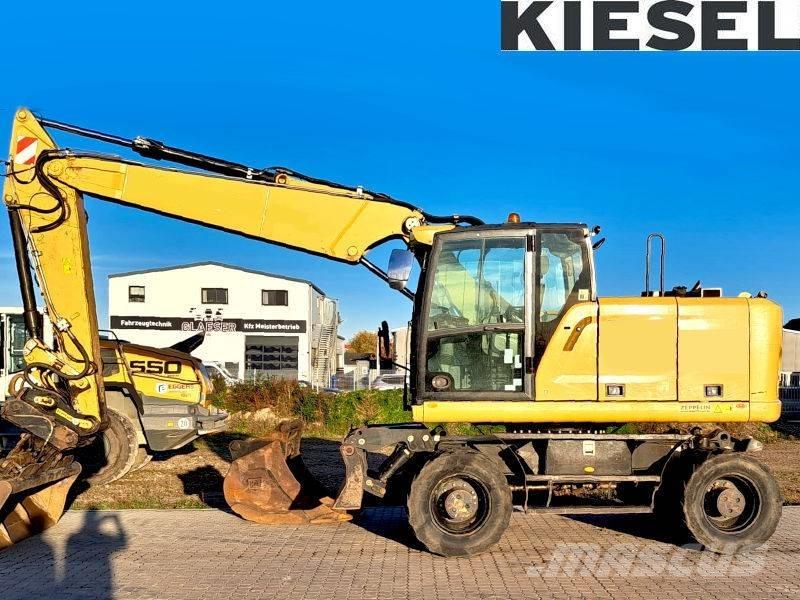 CAT M 318 F Gumikerekes kotrók