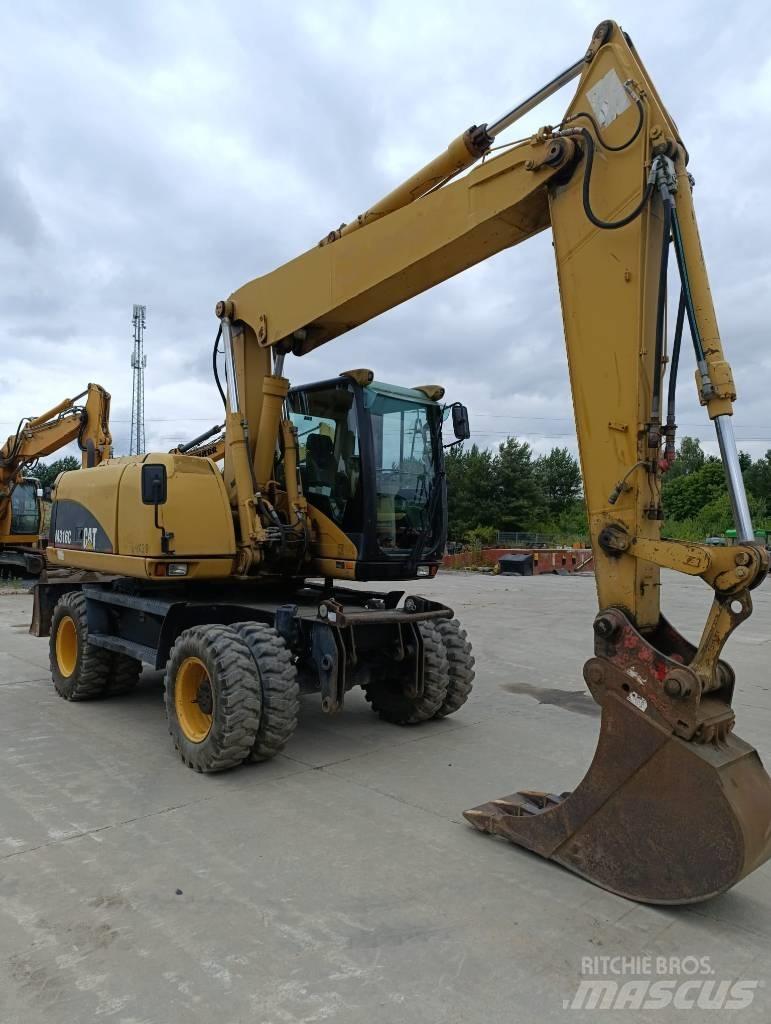 CAT M 316 C Gumikerekes kotrók