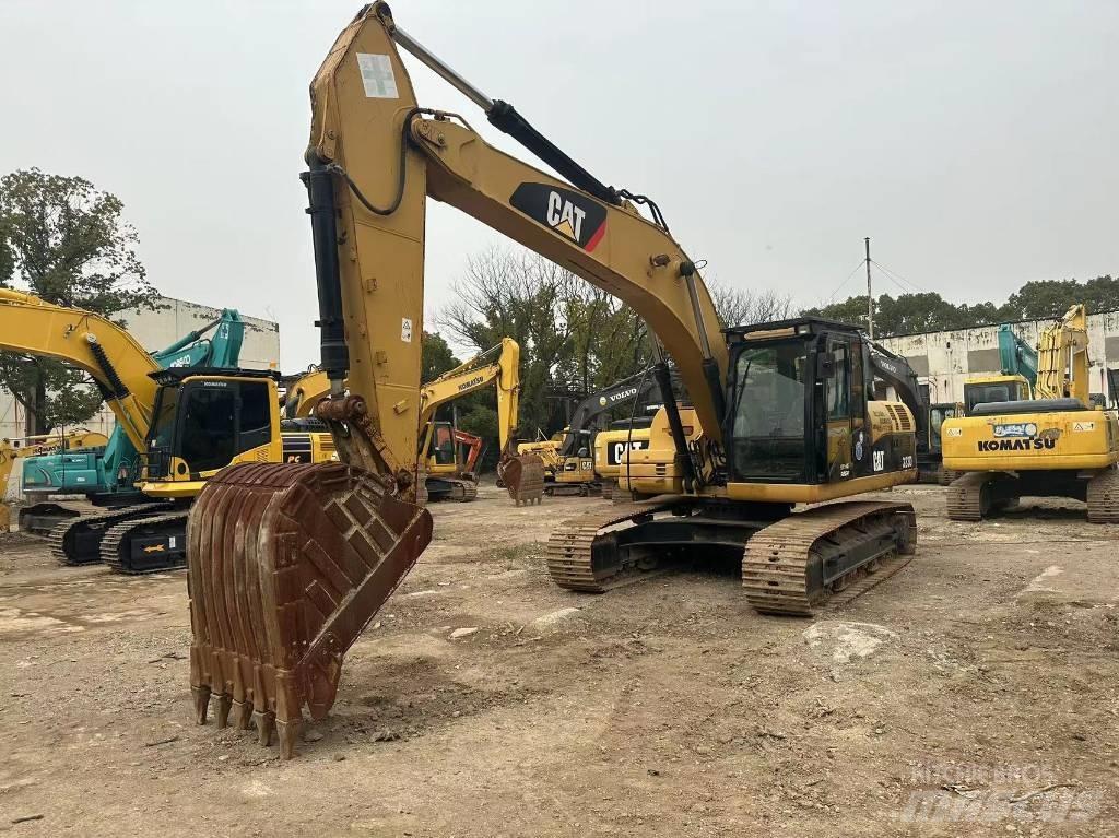 CAT 323D Lánctalpas kotrók