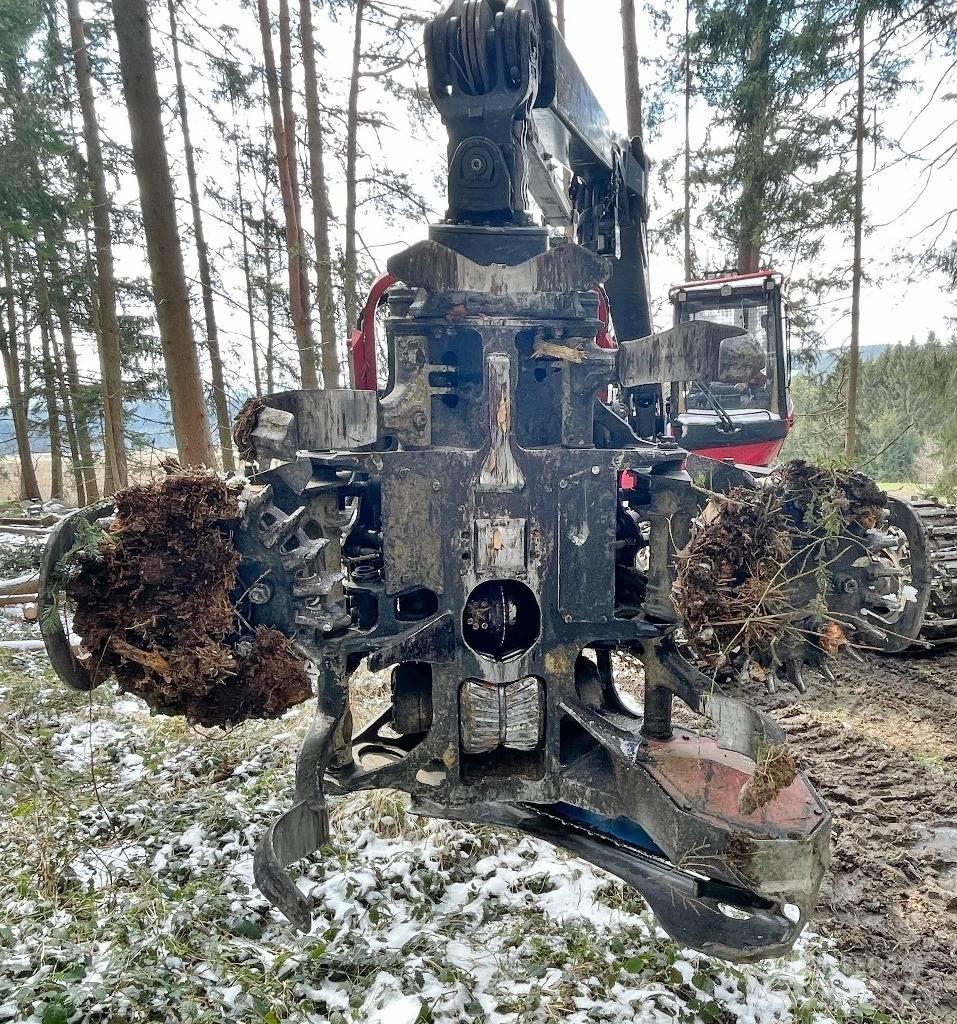 Komatsu 911.5 Betakarítók