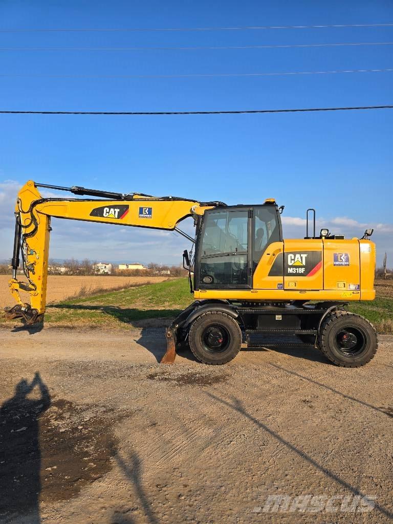 CAT 318 F Gumikerekes kotrók