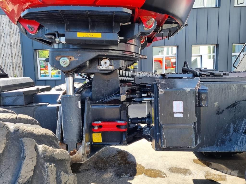 Komatsu 931 XC Betakarítók