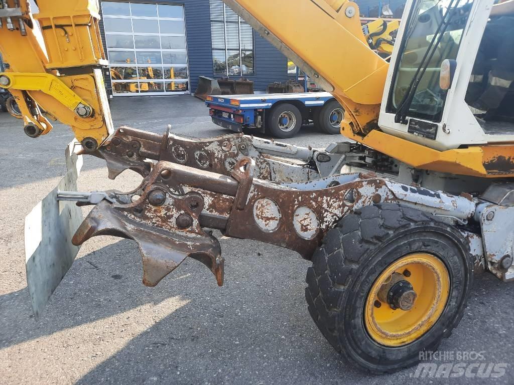 Menzi Muck M525 Gumikerekes kotrók