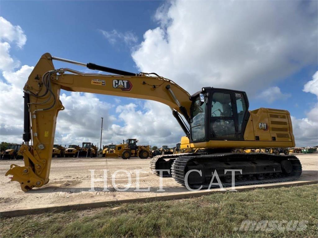 CAT 323 TC Gumikerekes homlokrakodók