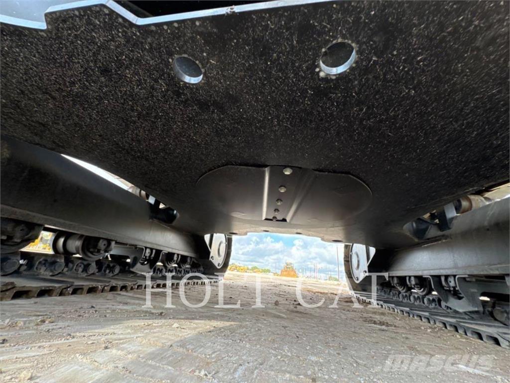 CAT 323 TC Gumikerekes homlokrakodók