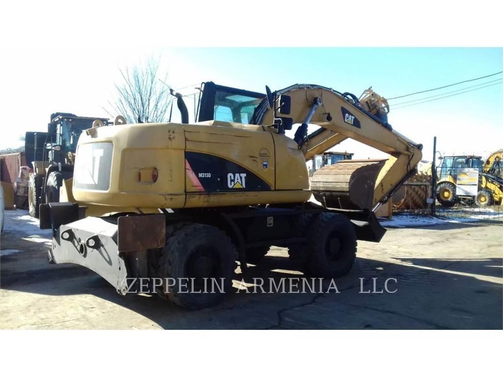 CAT M313D Gumikerekes kotrók