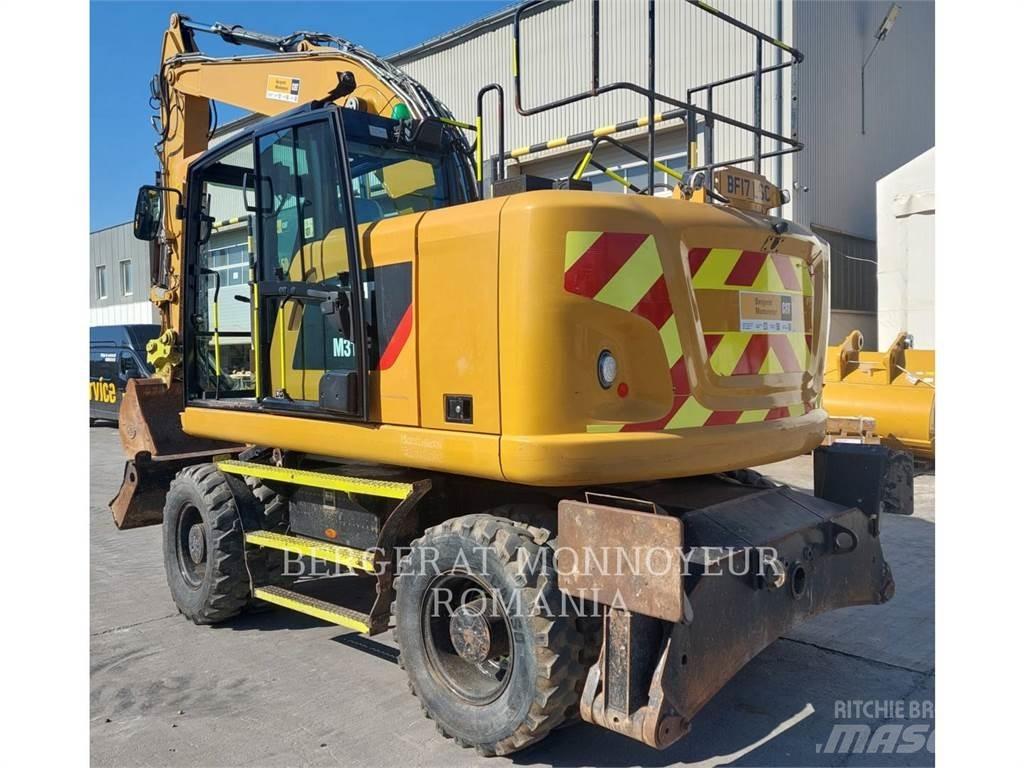 CAT M314F Gumikerekes kotrók