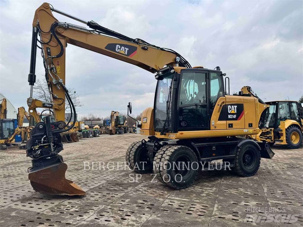 CAT M314F Gumikerekes kotrók