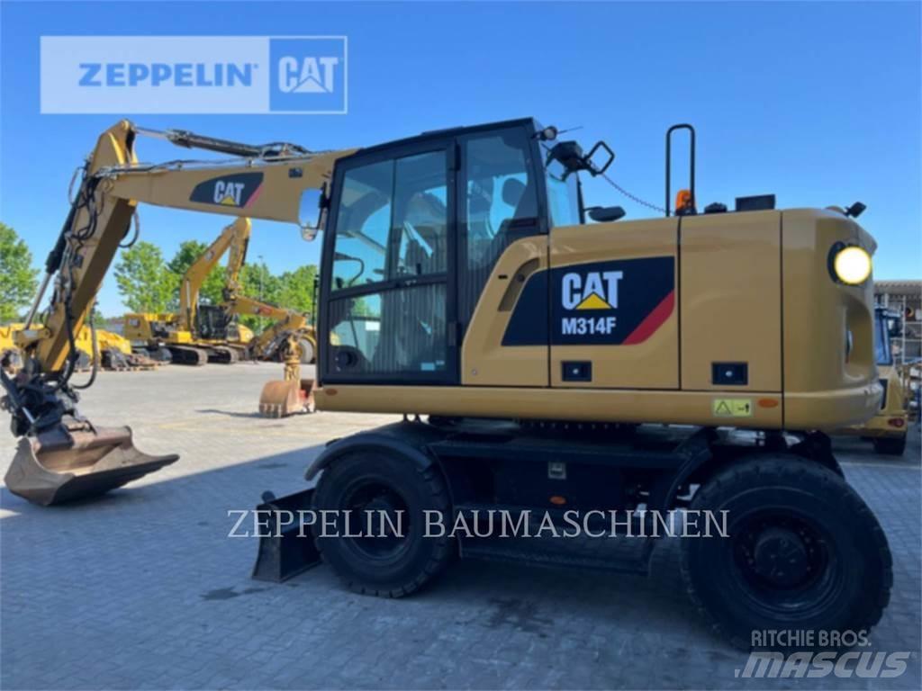 CAT M314F Gumikerekes kotrók