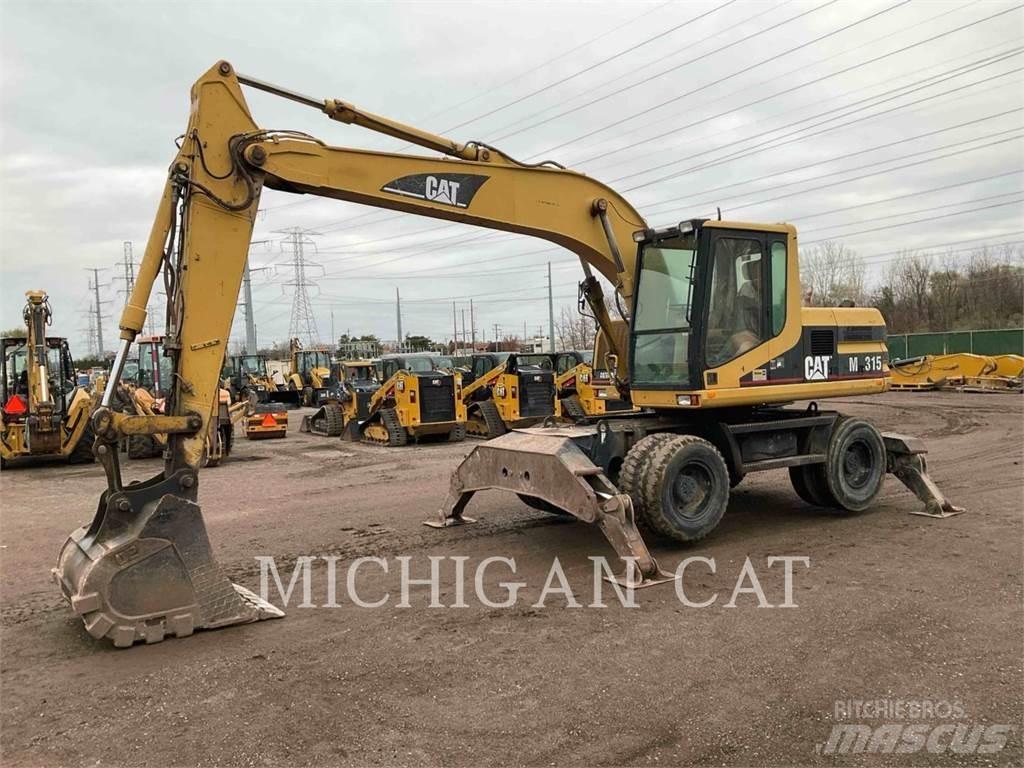 CAT M315 Gumikerekes kotrók