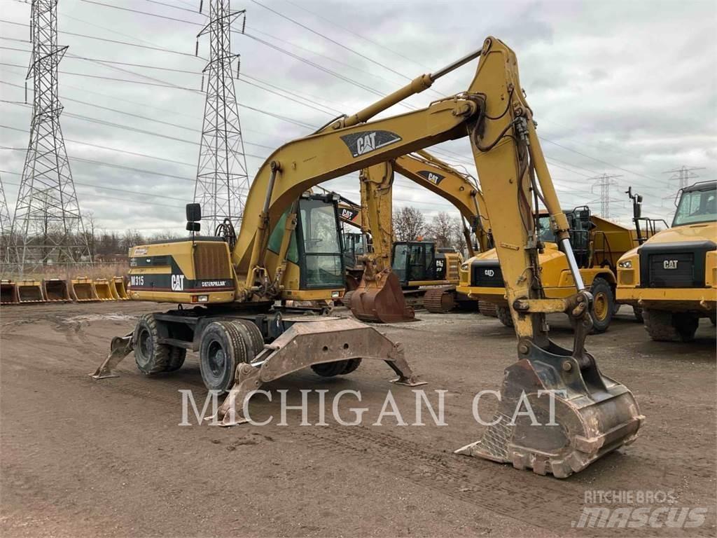 CAT M315 Gumikerekes kotrók