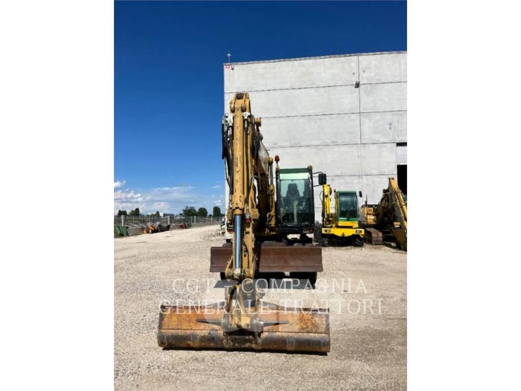 CAT M315C Gumikerekes kotrók