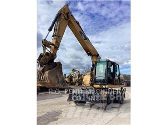CAT M315D Gumikerekes kotrók