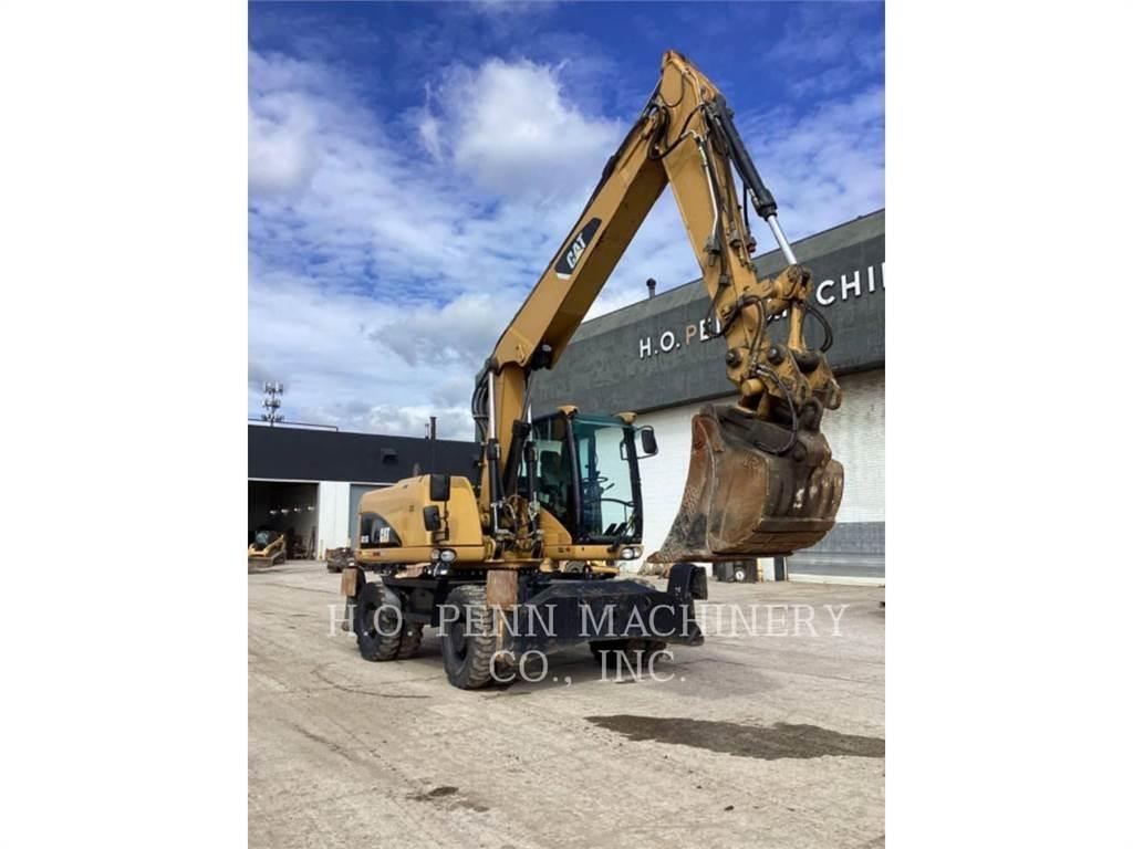 CAT M315D Gumikerekes kotrók