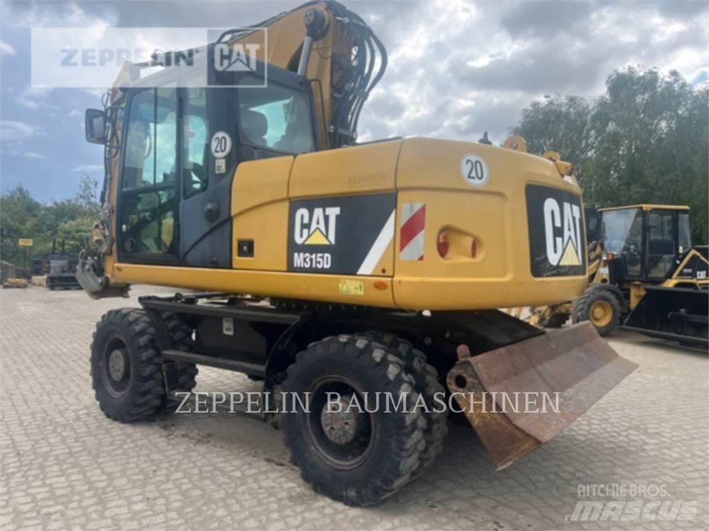 CAT M315D Gumikerekes kotrók