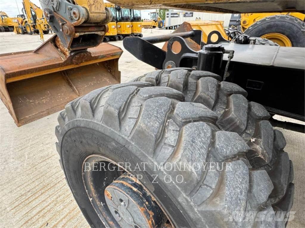 CAT M315D Gumikerekes kotrók