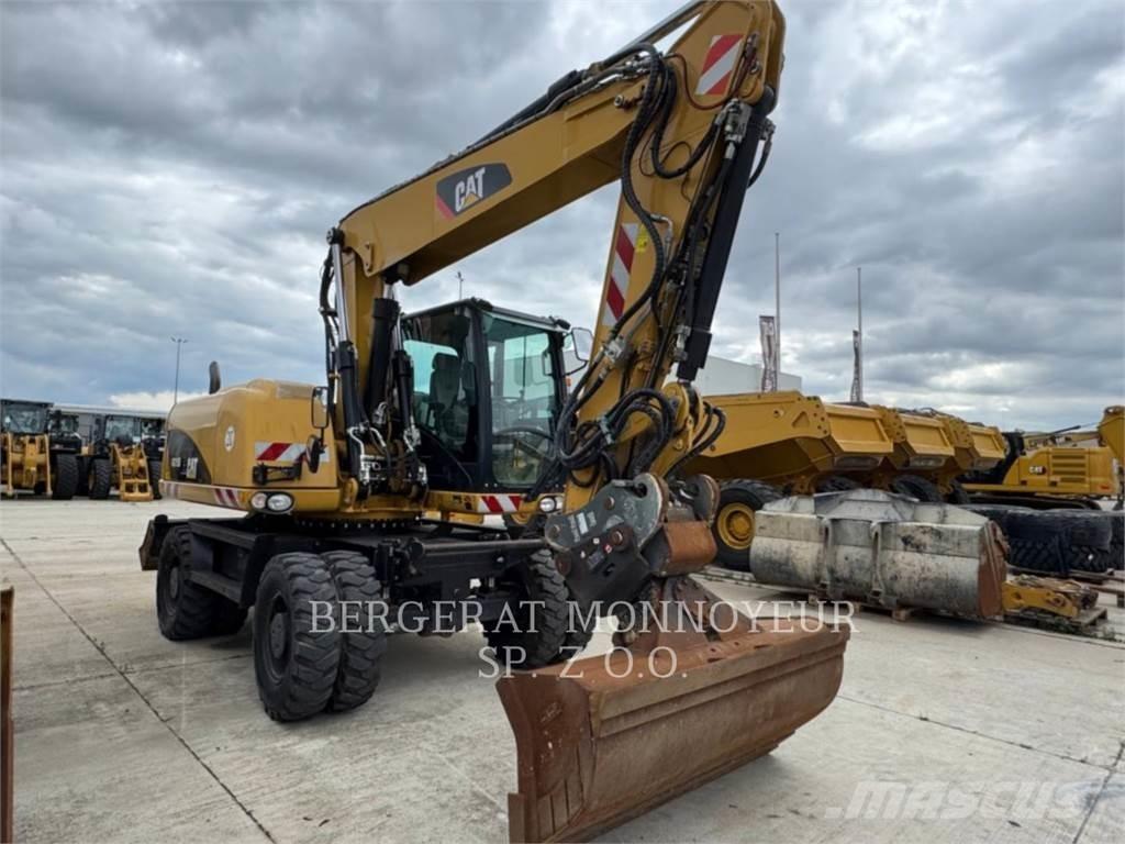CAT M315D Gumikerekes kotrók