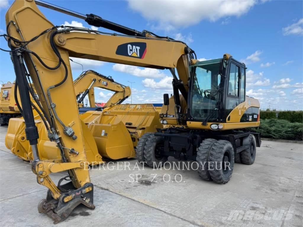 CAT M315D Gumikerekes kotrók