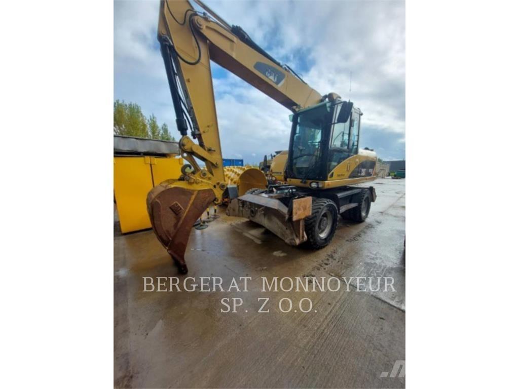 CAT M315D Gumikerekes kotrók