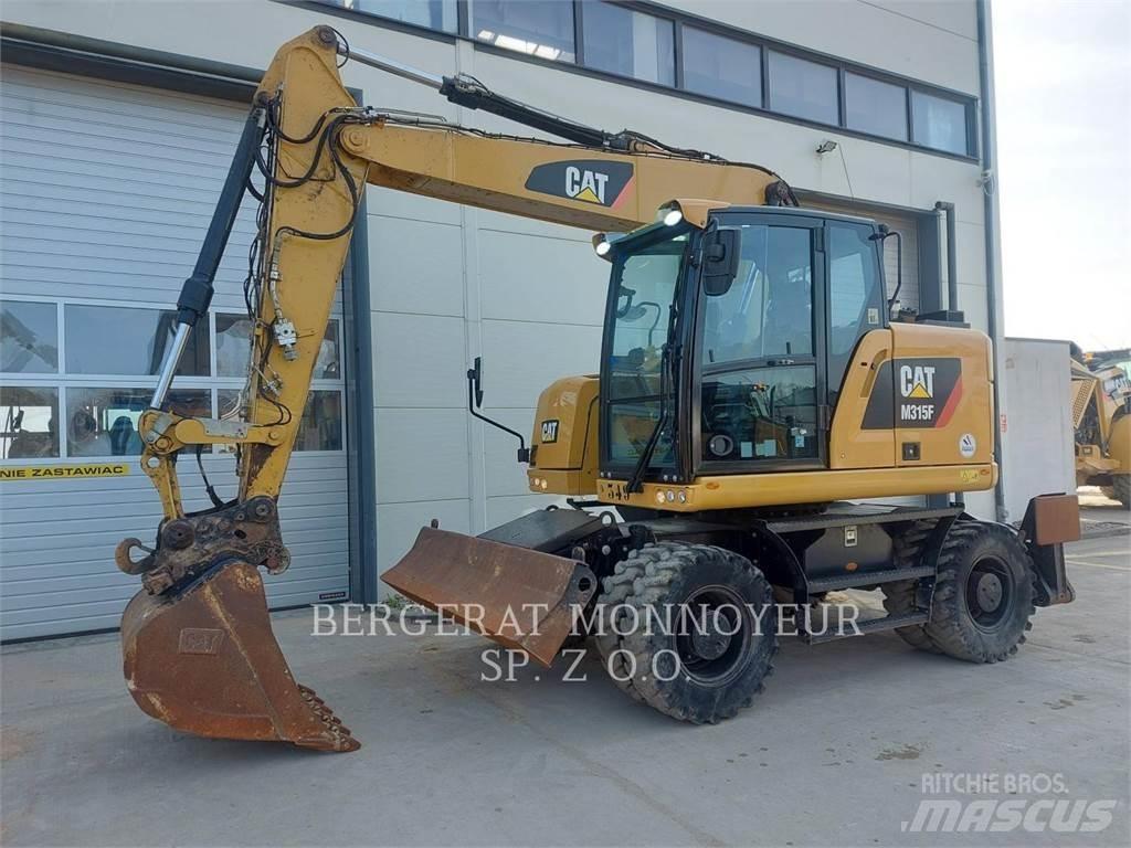 CAT M315F Gumikerekes kotrók