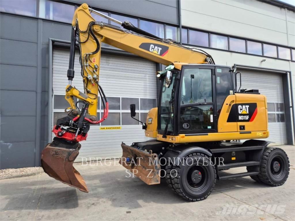 CAT M315F Gumikerekes kotrók